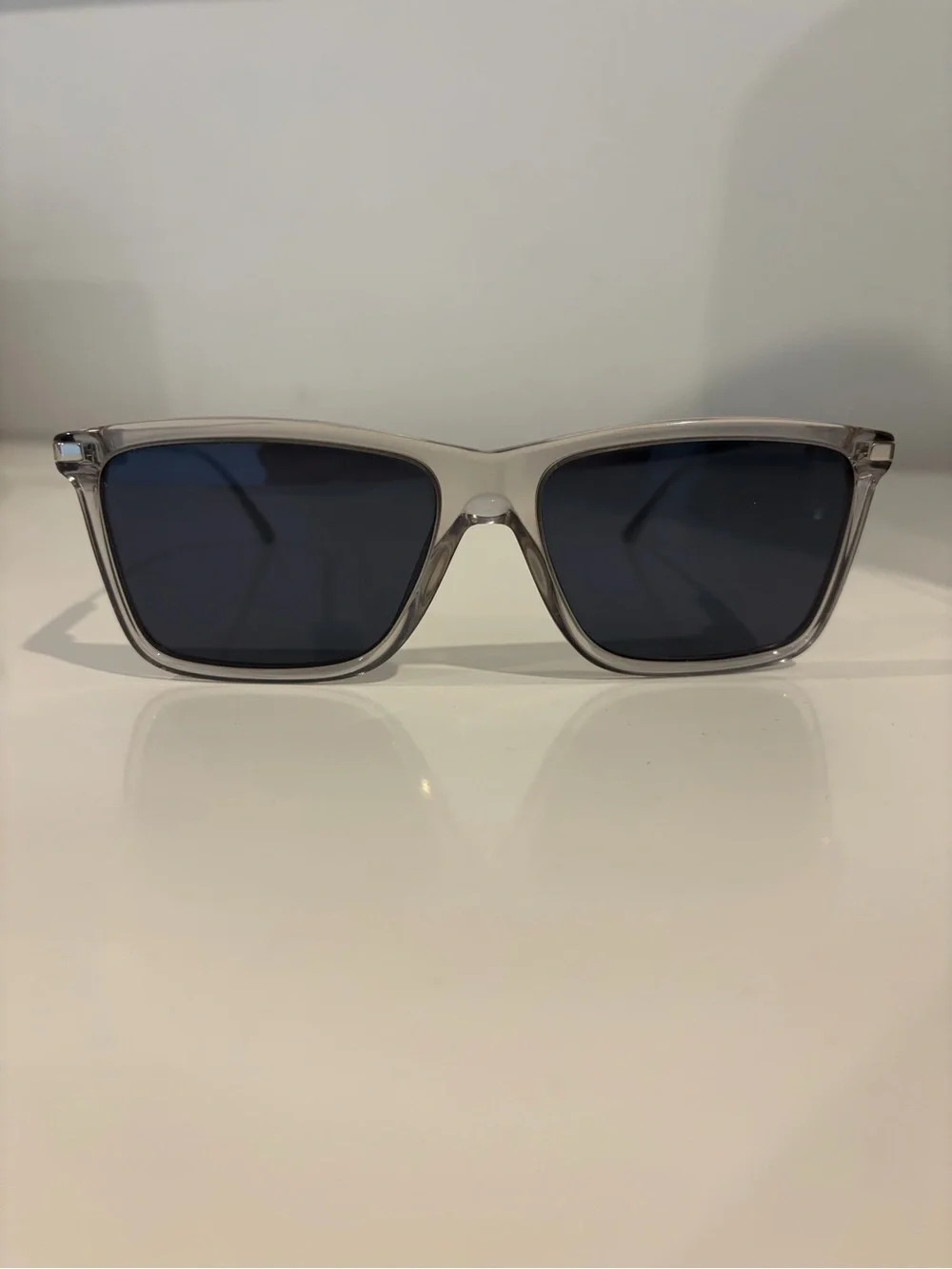 Prada Men’s Clear Frame Sunglasses with Dark Blue Lenses